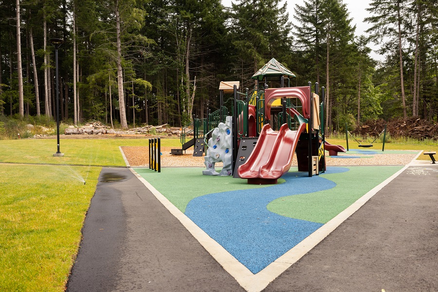 Both young children and older children have a place to play at K’ómoks First Nation’s community playground.